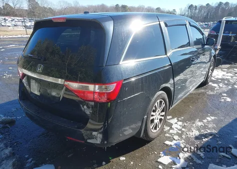 2011 Honda Odyssey Ex-L z USA, uszkodzony, nr VIN 5FNRL5H60BB012657